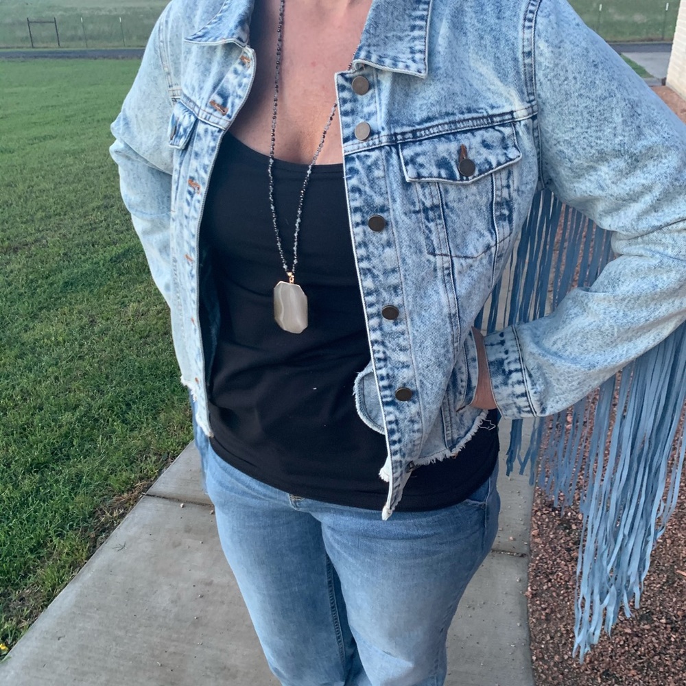 Denim jacket with fringe back!